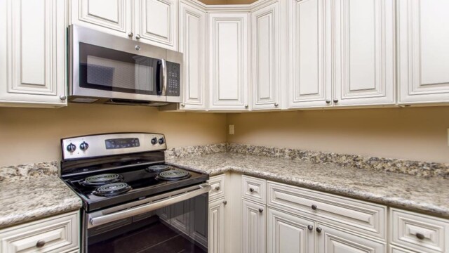 Spacious kitchen and custom cabinets in the Oak model