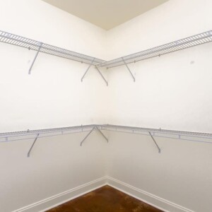 Spacious walk in closet in master bedroom of Oak model