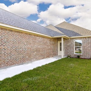 View of the side and front door of the Oak model home