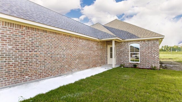 View of the side and front door of the Oak model home