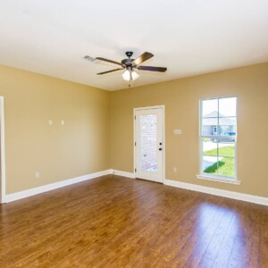 Living area and wood floors of the Willow Model