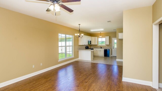 Wood floors in living area of the Willow Model