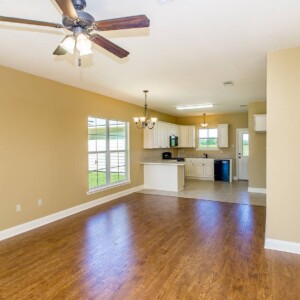 Wood floors in living area of the Willow Model