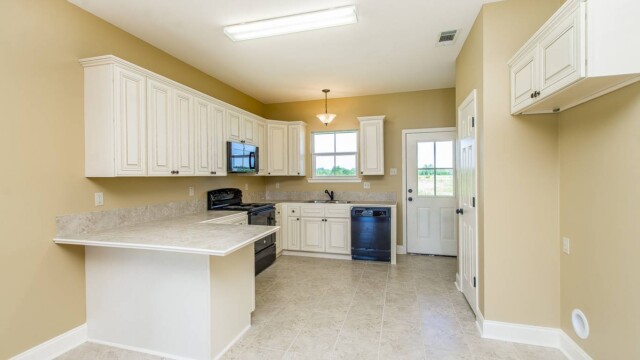 Full kitchen view of the Willow Model in Magnolia Springs