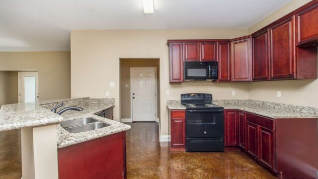 Cypress Model Kitchen Area and Cabinets in Magnolia Springs
