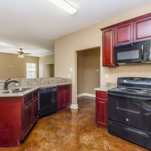 Cypress Model Kitchen Area and Cabinets in Magnolia Springs