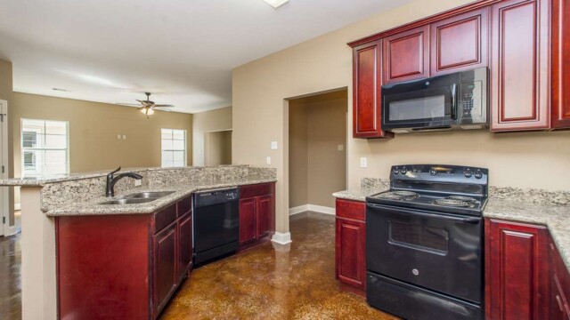 Cypress Model Kitchen Area and Cabinets in Magnolia Springs